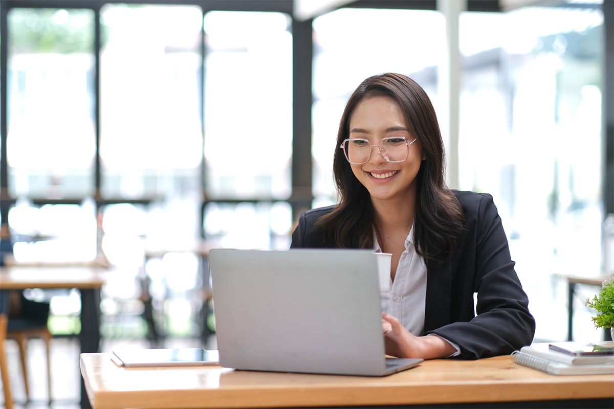 asian-business-woman-typing-on-laptop-in-office.jpg